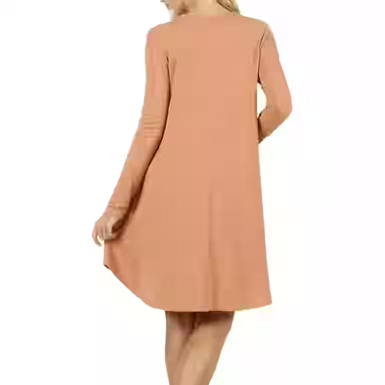 Back view of Zenana egg shell long sleeve dress in light brown color worn by model