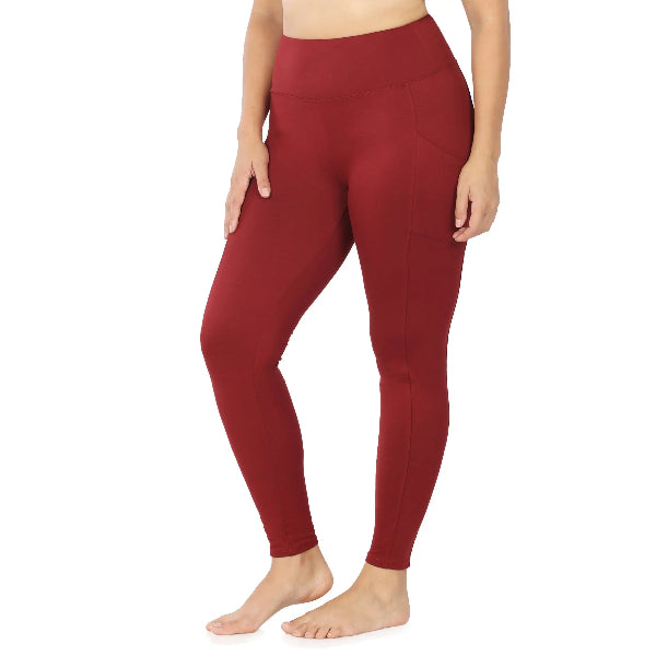 ZENANA high waist leggings with side pockets for women in maroon color worn by model