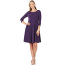 Woman wearing a purple premium cotton A line dress with three-quarter sleeves and round neckline
