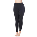 Black ZENANA high waist leggings with side pockets for women shown on model with bare feet